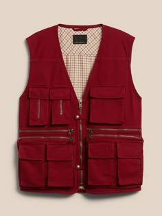 Spirited and resourceful, this rugged vest is modeled after a '90s style from our archives complete with 15—fifteen!—multifunctional pockets to store everything imaginable from cellphones to spare film canisters.  Reissued for the digital age, ou Utility Vest With Multiple Pockets For Travel, Utility Travel Vest With Multiple Pockets, Photographer Vest, Man Vest, Mens Smart Casual Outfits, Smart Casual Men, Red Vest, Diy Fashion Clothing, Street Fashion Men Streetwear