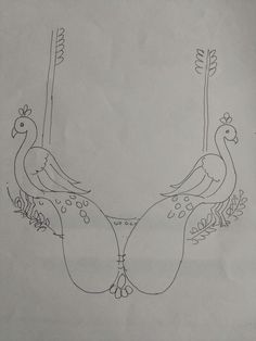 two birds sitting on top of each other in front of a white paper sheet with black ink