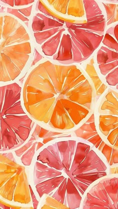 an orange and grapefruit cut in half