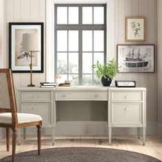 This executive desk is as handsome as it is handy, especially if you need some extra storage space in your home office. It's crafted from kiln-dried wood with a champagne finish, and it rests on four solid wood legs for added sturdiness. We love how the five dovetailed drawers, all on metal ball-bearing glides, give you a place to stash papers, writing utensils, and charging cables. And safety stops on the drawers prevent fingers from getting pinched. Plus, this desk's finished back makes it look great from any angle. Birch Lane™ Birch Lane™ Regan 66" Desk - Desks in Champagne | Size 30.5" H X 66" W X 28.5" D Double Pedestal Desk, Cosmoliving By Cosmopolitan, Pedestal Desk, Writing Utensils, Executive Desk, Hooker Furniture, Extra Storage Space, Kiln Dried Wood, Metal Ball