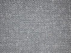 an upholstered gray fabric texture background