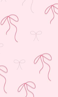 a pink wallpaper with red bows on it's sides and the words, i love