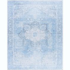 a blue and white rug with an ornate design on the middle, in front of a white background