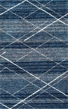 a blue rug with white lines on it