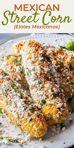 mexican street corn on a white plate with limes