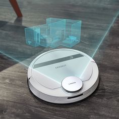 a roomba that has been placed on the floor with some glass cubes around it