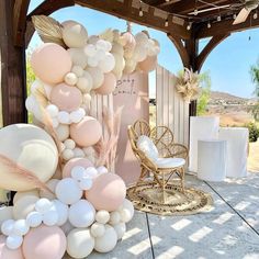 an outdoor area with white and pink decorations