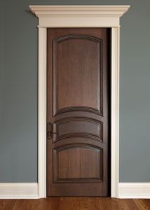 an open wooden door in a room