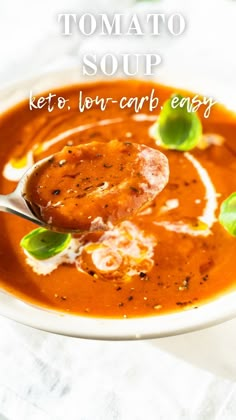 a bowl of tomato soup with a spoon in it and the title overlay reads, tomato soup keto - low carb easy