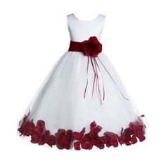 a white dress with red flowers on it