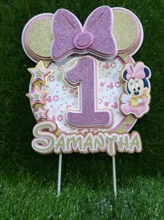 a minnie mouse 1st birthday cake topper