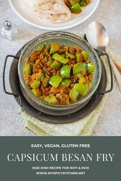 a bowl full of capsicum bean fry on top of a plate