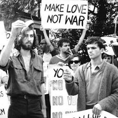 black and white photograph of men holding protest signs