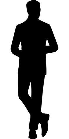 the silhouette of a man is standing with his hands in his pockets and shoes on