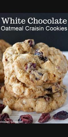 white chocolate oatmeal craisin cookies stacked on top of each other