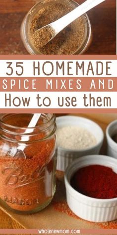 three jars filled with spices on top of a wooden table