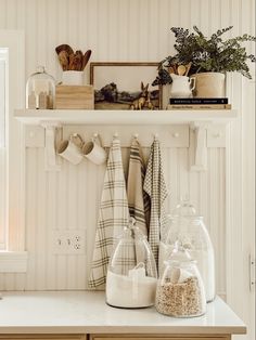 the kitchen counter is clean and ready to be used as a storage area for dishes