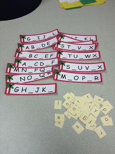 several pieces of paper with letters and numbers cut out to make them look like they are on the table