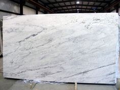 a white marble slab in a warehouse