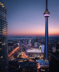 an aerial view of the space needle at dusk