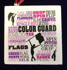 this is a cross stitch ornament with words about color guard