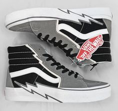 Vans SK8-HI Bolt Pewter Suede Leather High Top Sneaker Shoe Men's 8.5M / Gray / Black New. Padded ankle hi-top, red logo on back, stylin'. True to size From the manufacturer: Electrifying style, iconic comfort! Sporting thunderbolt detailing along the eyelets and rising from the front bumper, the Vans Sk8 Hi Bolt gives an exciting twist to a classic look. These high-top sneakers with vulcanized construction feature a padded collar and reinforced toe-cap for a snug and supportive fit. Give your sneaker game a refreshing new twist with the Vans Sk8 Hi Bolt. The leather and suede upper offers a polished look The signature rubber Waffle outsole ensures excellent traction and durability Leather and textile upper Textile lining and insole Classic lace-up closure Thunderbolt detailing along with Social Perception, Vans Boots, Custom Sneakers Diy, Mens Vans Shoes, Tenis Vans, Kicks Shoes, Vans Sk8 Hi, High Top Sneaker, Leather High Tops