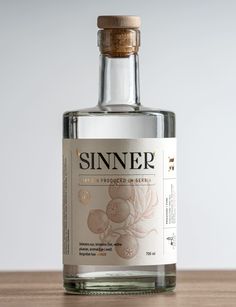 a bottle of ginner on a wooden table