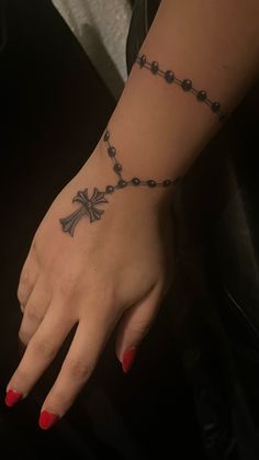 chrome hearts rosary tattoo Rosary On Hand Tattoo, Hand Tattoos Rosary, Hand Tattoos For Women Names, Arm To Hand Tattoos For Women, Cross Hand Tattoos, Girly Tattoo Sleeves, Mexican Hand Tattoos, Cross On Hand Tattoo, Rosery Tattoos Hand