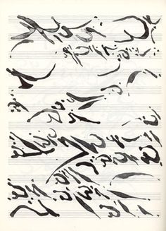 some type of calligraphy written in black ink on white paper with cursive writing