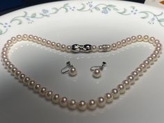 Offer is a stunning Mikimoto Akoya Pearl Necklace and Earrings Set. For earrings, pearl size is about 7-7.5mm and for necklace, pearl size ranges from 6.5-7mm. Breathtaking white color with strong pinkish, strong mirror like luster. Each pearl is perfectly round and without any visible blemishes, looks perfect! Clasp and settings are both 18K YG, with signature 'M' and '750' on them! Necklace is about 18inches long. This set comes with original pouch, certificate, mikimoto cloth and outside box. Excellent condition with no sign of previous wear. Great for any occasion, which will make you shine! Also great to pass on to generations! Please reach out if you have any questions or would like to see additional pictures, always happy to help! Thanks for looking and don't forget to check out my Saltwater Pearl Necklace, Pearl Necklace And Earrings, Akoya Pearl Necklace, Mikimoto Pearls, Saltwater Pearls, Loose Pearls, Necklace And Earrings Set, Necklace Pearl, Earrings Pearl