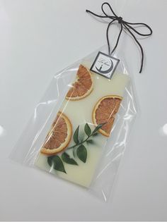 an orange slice is wrapped in cellophane