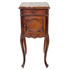 an old wooden cabinet with marble top and drawers on it's legs, against a white background