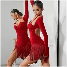 two beautiful women in red dresses posing for the camera with their hands behind their backs