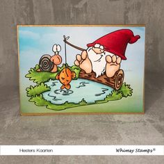 a card with an image of two gnomes on a log in the water and one is fishing