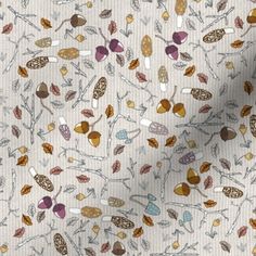 an image of a white fabric with leaves and dots on the back half of it