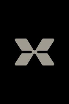 the letter x is made up of two intersecting lines on a black background with white letters