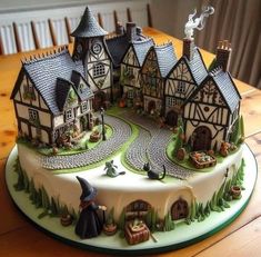 a cake that is shaped like a village