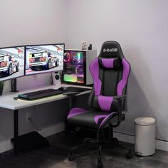 a computer desk with two monitors and a keyboard on it, along with a gaming chair