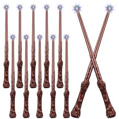 six different types of sticks with stars in the middle and one is made out of copper