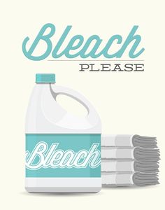 a bottle of bleach sitting next to stacks of towels