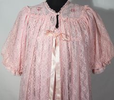 Here is a very special, rare 1960's bedroom night gown and robe set that has an original and collectible made in USA union stamp label. This sweet 60s lounge wear set is in a pink synthetic blend (acetate and nylon) sheer material with fabulous off lace trim and a very long maxi A line sweeping cut with romantic, half sleeves and beautifully tailored details. You'll love feeling like a dream in this lovely, fancy yet so comfy wonderful 2 piece addition to your lounge wear. This midcentury vintag Vintage Pink Robe For Loungewear, Vintage Nightgown With Ruffles For Loungewear, Vintage Ruffled Nightgown For Loungewear, Vintage Pink Sleepwear, Vintage Spring Robe For Home, Vintage Pink Sleepwear For Wedding Night, Vintage Lace Sleepwear, Vintage Lace Trim Robe For Spring, Vintage Lace Sleepwear For Home