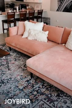 a living room filled with furniture and decor