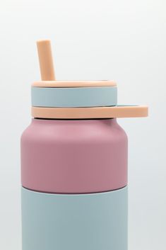 a pink and blue drink bottle with a straw sticking out of it's lid