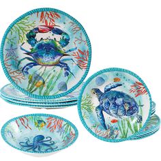 three plates with blue and green designs on them, one has an octopus and the other is crabfish