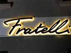 a neon sign that says fratell on it