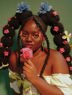 Black girl with bubble braids, wearing a white top, holding a rose. Pink and blue flowers are in her hair. Persephone Hairstyle, Black Hair With Flowers, Goddess Looking Women, Black Cottagecore Hairstyles, Holding A Rose, Rose Character, Holding Rose Pose, Cute Afro Styles, How To Put Hair Up