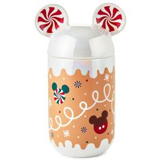 a mickey mouse cookie jar with candy canes