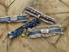 Handmade, one of a kind, denim bracelets. Size adjustable and may vary. Each sold separately. | Handmade Denim Bracelets Denim Bracelets, Denim Bracelet, Art Studio Space, Leg Lamp, Camping With A Baby, Denim Jewelry, Artisan Bracelets, Painted Wood Signs, Cute Signs