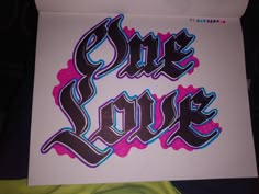 some type of sticker that says one love