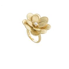 ITEM # AB606 B Y 02 Details 18K Yellow Gold and Diamond Petali Large Flower Ring. Simple yet organic shapes inspired by the delicate shape of the Lunaria flower. ul { list-style-type: square; } Orchid Ring, Marco Bicego Jewelry, Italian Jewelry Designers, Textured Gold Ring, Flower Diamond Ring, Flower Silhouette, Gold Flower Ring, Marco Bicego, Diamond Flower